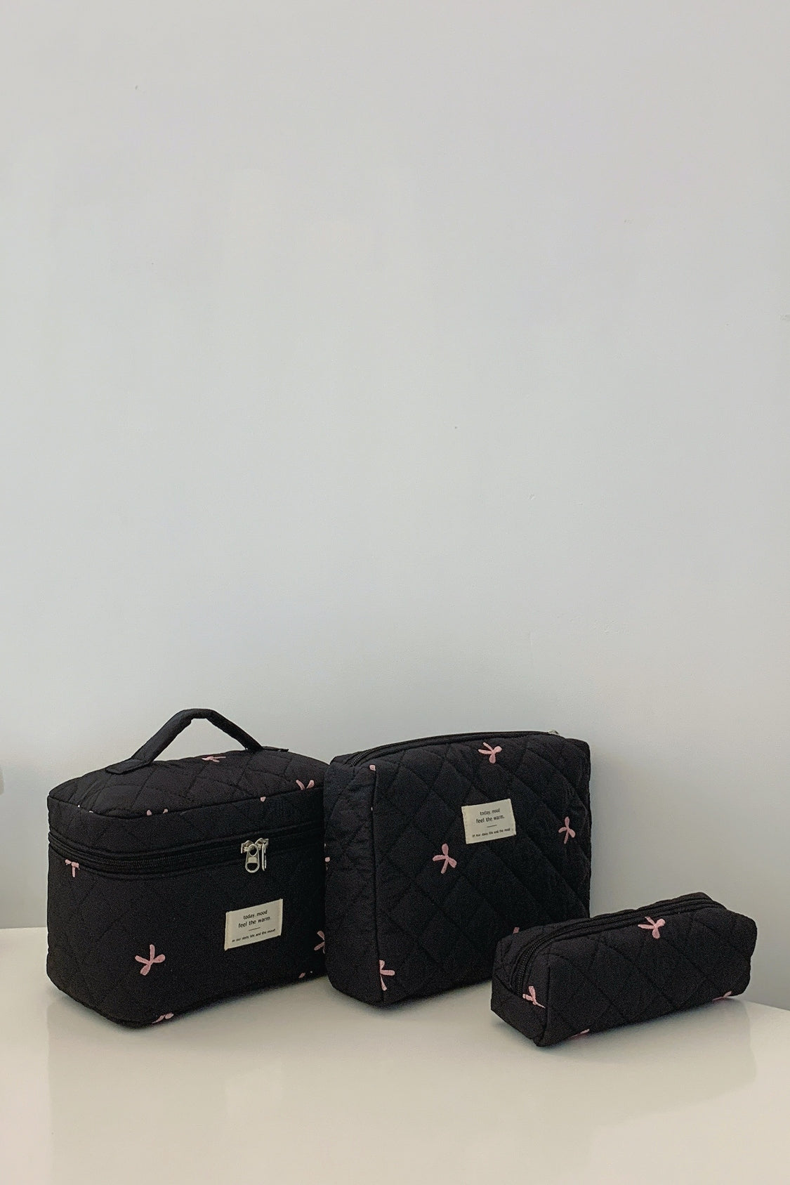 The Bella 3 Piece Bow Quilted Cloth Storage Bag Set