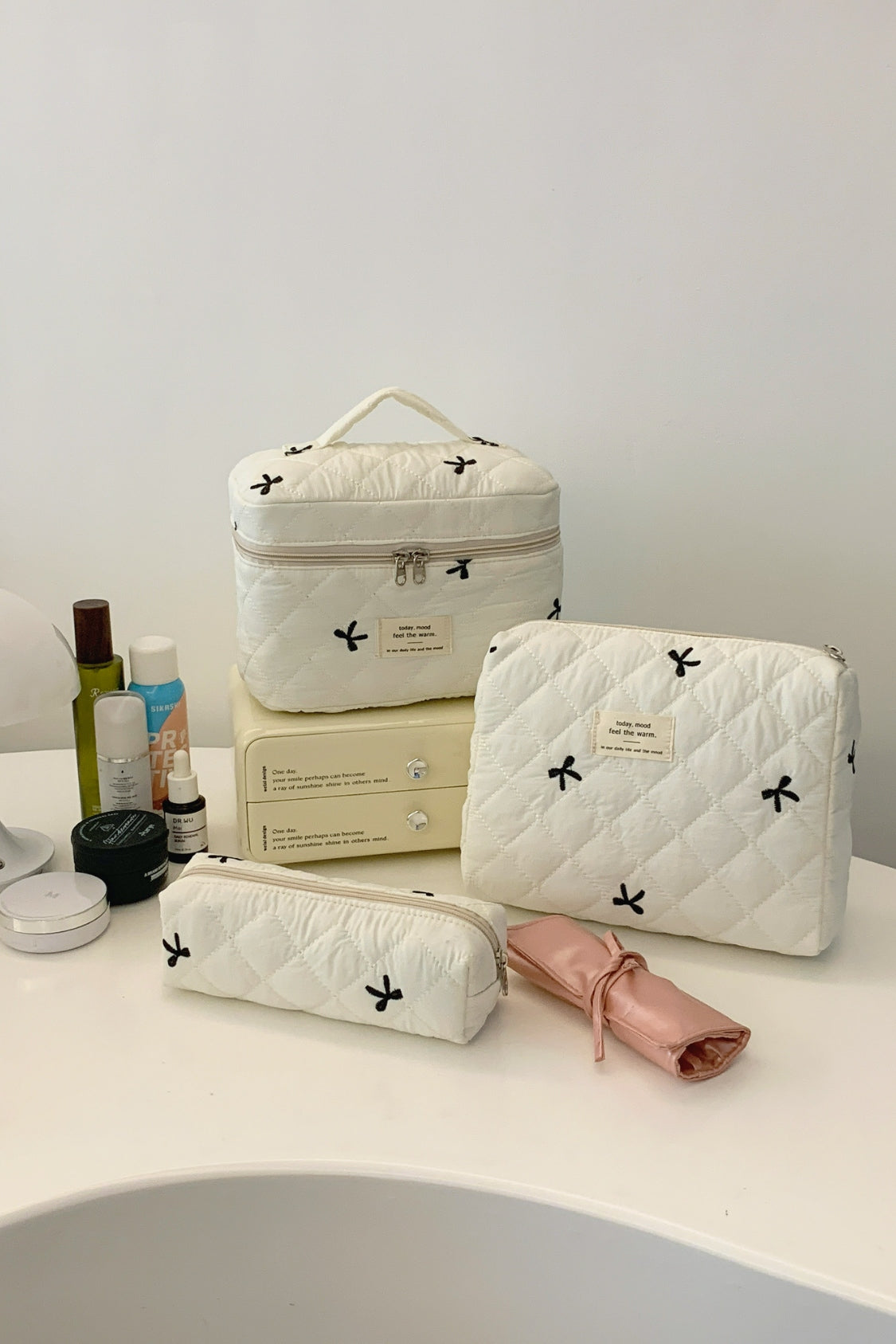 The Bella 3 Piece Bow Quilted Cloth Storage Bag Set