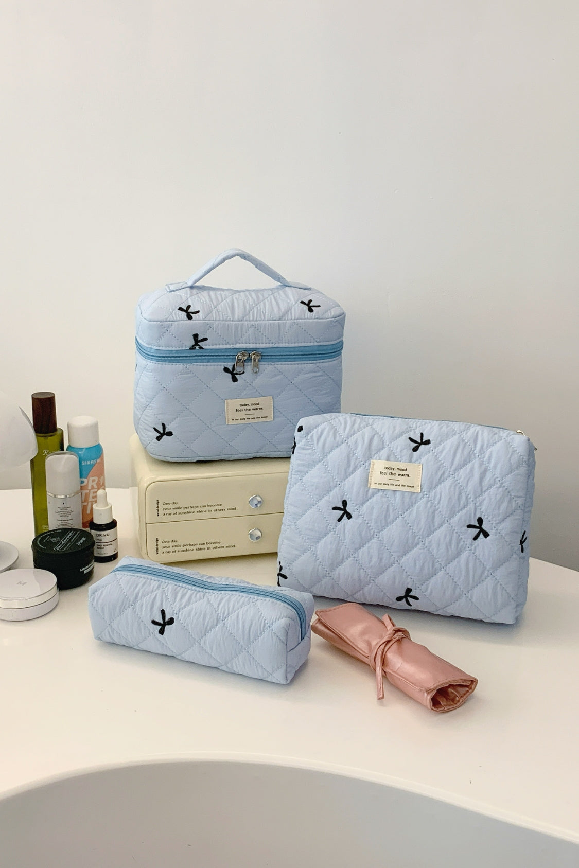 The Bella 3 Piece Bow Quilted Cloth Storage Bag Set